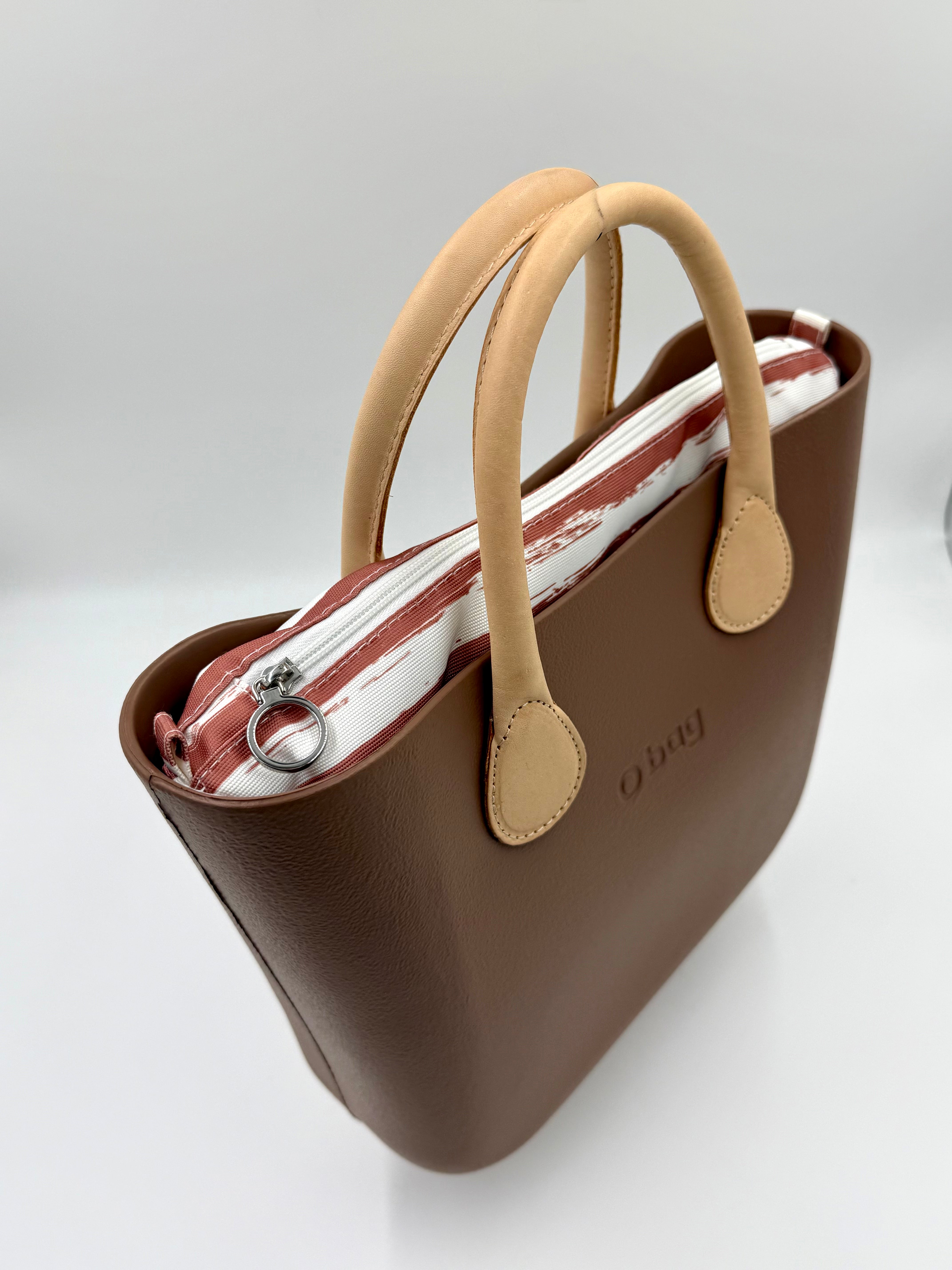 O bag Mini – taupe (greige) handbag with cream handles, striped zippered lining