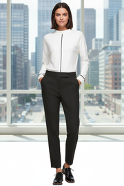Woman wearing s.Oliver black tailored trousers in professional setting